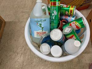 Laundry Basket of Cleaning Supplies...