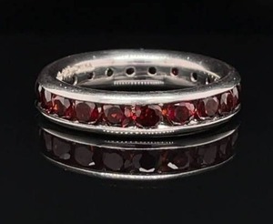 An Eternity of Elegance Estate Orange-Red Eternity Channel Ring in 925 Sterling Silver