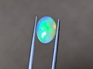 1.94 Carat Aqueous, Brilliant Natural Welo Opal Gemstone VIDEO