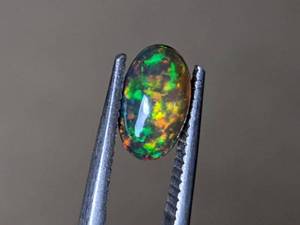 Stunning 1.18 Carat Natural Black Welo Opal Gemstone VIDEO
