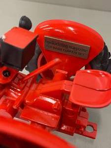 lot 25 image: CASE 1998 Agri Conference Magazine Collectible 116th Scale Metal Tractor Toy
