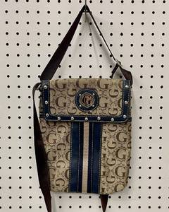 lot 38 image: Vera Pella Italian Leather Crossbody Purse  Guess Jeans Brand Crossbody Purse