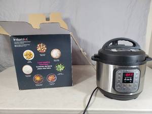 lot 97 image: Instant Pot 3 Quart