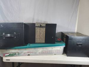 lot 222 image: 3 Storage Boxes and Suncast Wrapping Paper Holder Full of Wrapping Paper