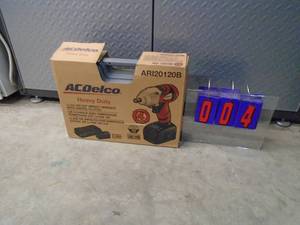 AC Delco 38 cordless impact. 18 volt lithium ion 2 batteries & 1 charger. Was a show display. As shown.