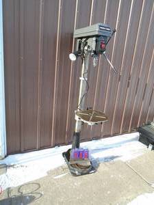 Porter Cable 12 speed upright drill press. Newer unit. Base has been replaced. Tested & works. As shown.