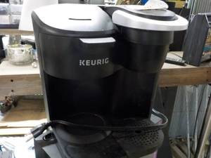 Keurig powers on...