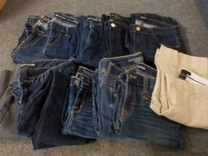 11 Pair size 2 Jeans and Slacks...