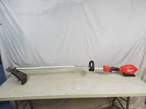lot 26 image: Milwaukee M18 FUEL 18-Volt Lithium-Ion Cordless Brushless String Grass Trimmer