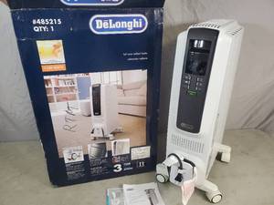 lot 34 image: New DeLonghi Radiant Oil Filled Space Heater on Wheels