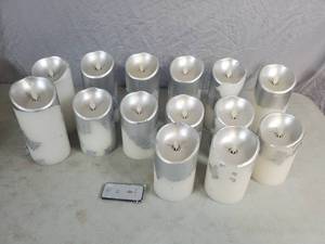 lot 77 image: 14 Luminara Flameless Pillar Candles with Universal Remote