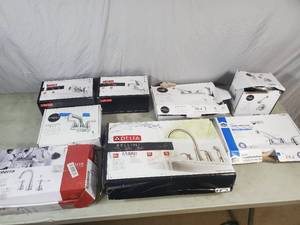 lot 130 image: Customer Return Kitchen Faucets, Bathroom Faucets, Etc