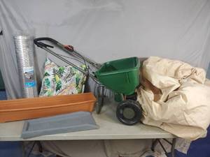 lot 134 image: Lawn Spreader, Patio Furniture Cover, Aluminum Duct, and More