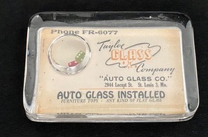lot 32 image: Vintage Taylor Glass Co. Advertising Paperweight