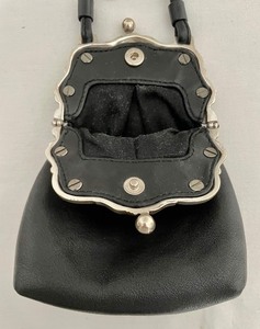 lot 197 image: One World by Brighton Purse