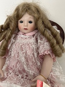 lot 108 image: Vintage Doll- Goldilocks by Pauline & Doll Chair