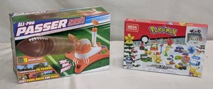 lot 43 image: All Pro Passer Robotic Quarterback and Mega Construx Pokmon Holiday Calendar Construction Set
