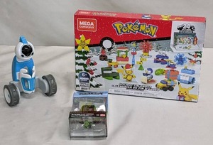 lot 46 image: Kids Minecraft Interactive Watch, Mega Construx Pokmon Holiday Calendar Construction Set AND HEXBUG ROBOT