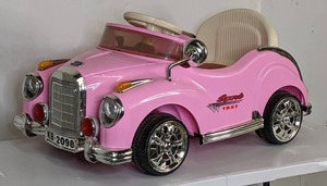 lot 115 image: Ride On Toy Car, Battery Powered Classic Car Coupe With Remote Control and Sound by Lil Rider - Toys for Boys and Girls, 3 Year Olds And Up (PINK)