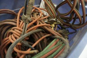 Large Lot of Acetylene Torch Hoses, Gauges and Cutting Heads