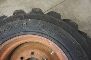 Bobcat Brand Skid Loader Tire on 8 Bolt Rim