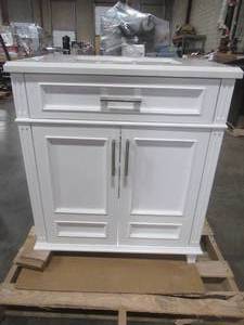 lot 207 image: Athea 30 in. W Bath Vanity in White with Engineered Stone Composite Vanity Top in White with White Basin - Missing Left Front Foot.