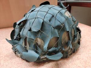 lot 85 image: Military Helmet