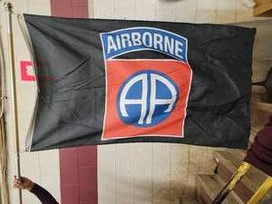 lot 88 image: Airborne and Dessert Storm Flags on Flag Poles