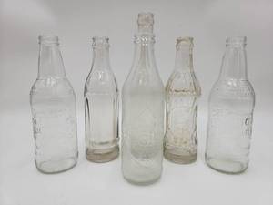 lot 115 image: 6 Vintage Glass Bottles-JBC Soft Drinks, Coke, Whale, Pepsi