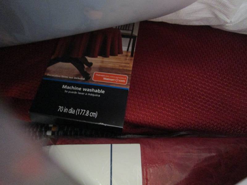 box of tablecloths and runners ...
