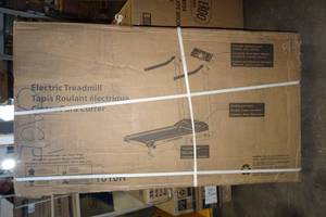 lot 10 image: New Paradigm 1010H Electric Treadmill