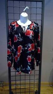 lot 66 image: Flora print blouse small