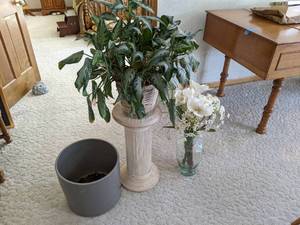 lot 25 image: Small Pedestal with Aglaonema Plant, Glass Vase w Artificial Flowers, & Large Grey Planter