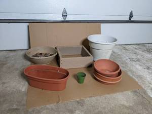 lot 74 image: All the Plant Pots and Saucers