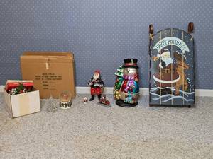 lot 121 image: Christmas Decor Lot - Snow Globe, Decorative Sled, Motorcycle Santa, Garland, and more