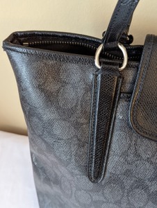 lot 76 image: Coach Canvas and Leather Monogram Tote