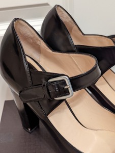 lot 84 image: Cole Haan Black Patent Leather Mary Janes