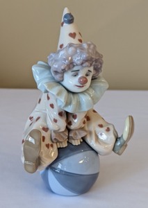 lot 162 image: Lladro Having a Ball Figurine