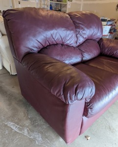 lot 207 image: Burgundy Leather Loveseat