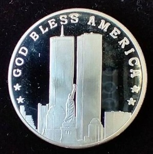 9112001 Twin Towers 1 Oz. Silver Round