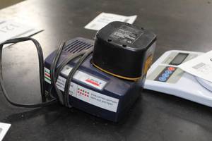 lot 138 image: Lincoln Battery Charger with 12V Nickel Cadmium Battery