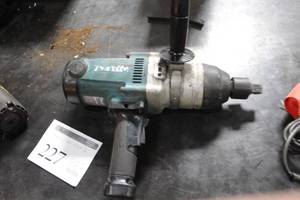 lot 227 image: Makita TW1000 1 Impact Wrench