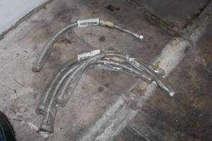 lot 575 image: Lot of (4) Stainless Steel Flex Lines