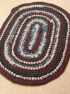 lot 33 image: Small Vintage Braided Rug