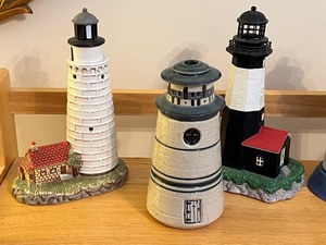 lot 45 image: Lighthouse Figurine Decor including Light House Figurine Lamps & Oil Candle Holder