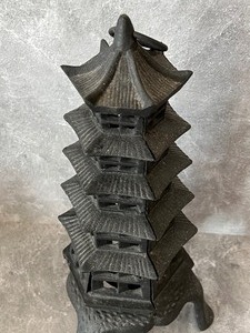 lot 250 image: Cast Iron Pagoda Candle Holder