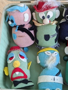 lot 328 image: Vintage Suitcase and Adorable Handmade Sock Toys