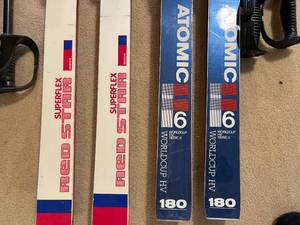 lot 521 image: Vintage Kneissel and Atomic Skis With Poles