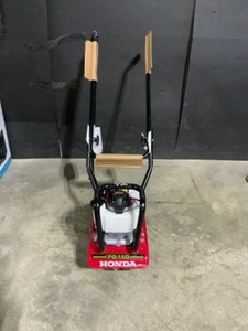 Honda 9 in. 25 cc 4-Cycle Middle Tine Forward-Rotating Gas Mini Tiller-Cultivator. See Pictures