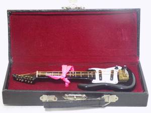 lot 29 image: Miniature Guitar Replica